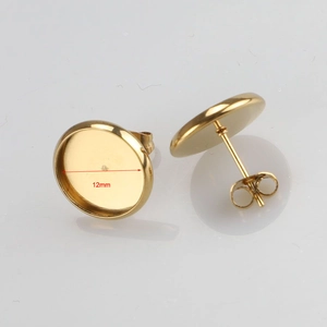 Close-up of 12mm gold-plated stainless steel stud earring blanks for DIY jewelry