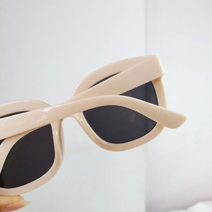 Fashionable retro square oversized sunglasses in warm beige with thick frames for women