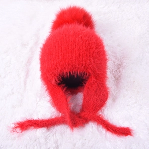 Winter red plush knit hat for kids with large faux fur pompom and earflaps