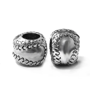 Macro detail of silver metal baseball stitching charms for DIY European bracelets