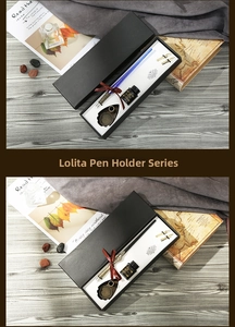 Calligraphy glass dip pen set with ink and nibs in a vintage black gift box with a red bow