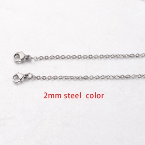 Detailed macro view of 2mm steel color stainless steel chain necklace connector