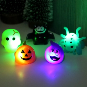 Halloween LED glowing rings featuring pumpkin skull and bat shapes for party favors