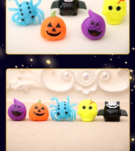 Detailed view of colorful Halloween LED rings featuring pumpkin, ghost, and bat designs