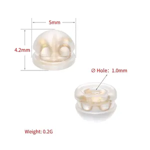 5mm Copper and silicone earring backs with gold plating shown in side and top views