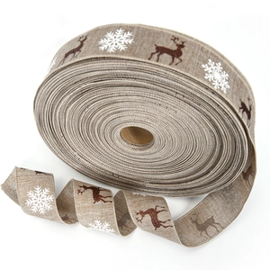 Linen Christmas ribbon roll with white snowflake and brown reindeer patterns for DIY gifts
