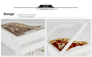 Detail of white classical piano music box with transparent floral lid and gold mechanism