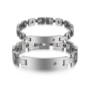 Detail showing magnetic stainless steel couples bracelets with sparkling rhinestones