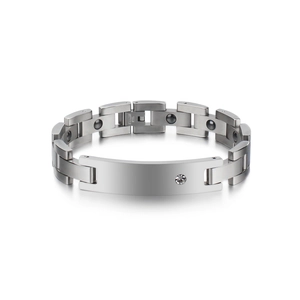 Close-up of silver stainless steel magnetic bracelet with a single inset zircon stone
