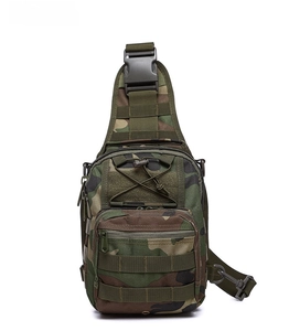 Detail of jungle camouflage tactical sling bag with Molle system and quick-release buckle