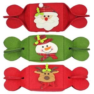 Three Christmas candy-shaped felt gift bags with Santa, snowman and reindeer designs