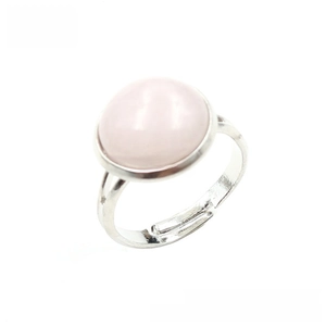 Detailed view of pink oval crystal bead on an adjustable silver open ring band
