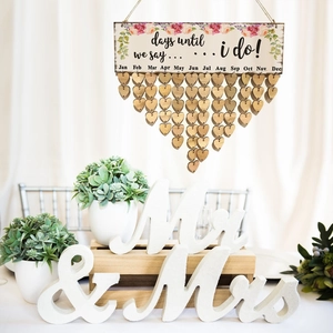 Wedding countdown wooden sign with Mr & Mrs decorations and heart-shaped discs