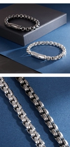 Close-up detail of vintage steel chain link bracelet with polished and matte finish