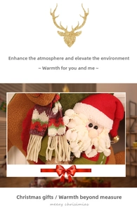 Detail of Christmas stocking with plush reindeer and Santa elements with golden bells