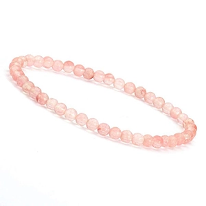 Detailed view of a 4mm pink strawberry quartz beaded bracelet with translucent texture