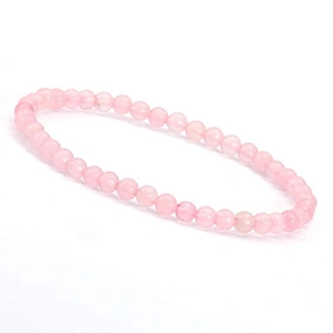 Close-up of 6mm pink quartz natural stone beaded bracelet on white background