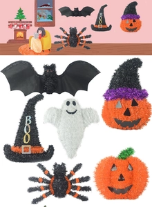Detailed view of 6-piece Halloween tinsel hanging set featuring bats, pumpkins, and ghosts
