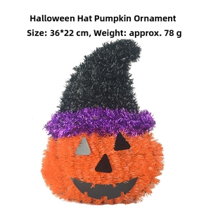 Detail of Halloween pumpkin ornament with witch hat and tinsel, size 36x22cm