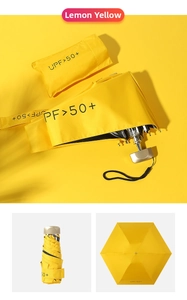 Detail of lemon yellow mini 5-fold sun umbrella and storage bag with UPF 50+ protection
