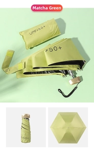 Mini folding matcha green sun umbrella with UPF 50+ sun protection and matching storage bag