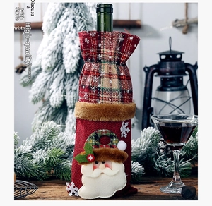 Detailed Christmas wine bottle cover with Santa Claus design and red plaid burlap fabric
