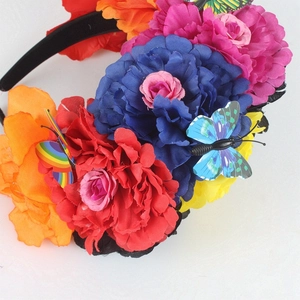 Close-up of Mexican style floral headband with colorful roses and butterflies