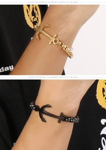 Close-up of anchor pendant bracelets in gold chain and black bead styles for men