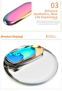 Close-up of heart and oval stainless steel jewelry trays in various metallic finishes