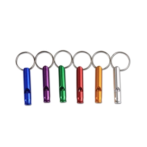 Set of 6 colorful aluminum emergency survival whistles with keychains on white background