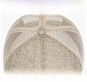 Detailed macro view of the breathable mesh fabric and linen texture on the sport cap crown