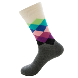 Detail of argyle pattern crew socks with colorful geometric diamond knit and grey foot