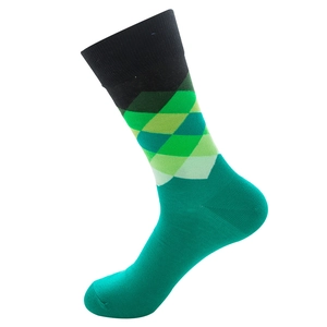 Detail of argyle pattern socks in green and black with quality knit texture