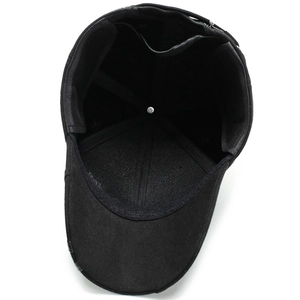 Interior view of warm black wool baseball cap for men with ear flaps and thickened lining