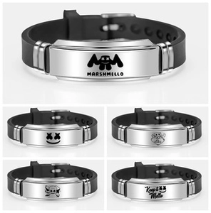 Detail of Marshmello silicone sports bracelets with engraved stainless steel plates