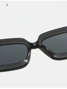 Detail of comfortable integrated nose pads on black rectangular sunglasses for daily wear
