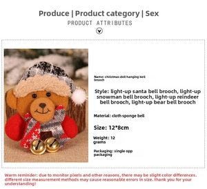 Christmas bear brooch detail view, plush stuffed doll accessory with LED lights and bells.