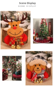 Detailed view of plush Christmas reindeer and bear ornaments with bells and scarves