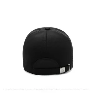 Detail of winter baseball cap rear with adjustable metal buckle and embossed M logo