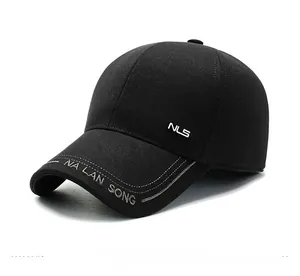 Detail of men's winter baseball cap showing side metal NLS logo and premium stitching