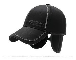 Detail view of winter baseball cap with ear flaps and SPORTS embroidery in black wool