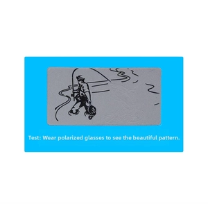 Detailed polarized sunglasses test card with fisherman graphic for lens verification