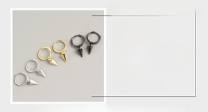 Detail of S925 sterling silver cone drop earrings in silver, gold and black finishes