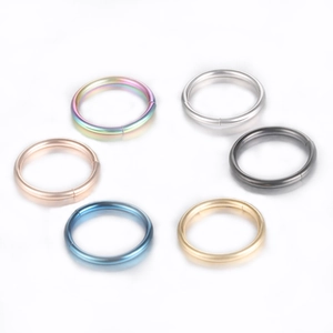 Set of six stainless steel nose hoops in silver, gold, black, blue, rose gold, and rainbow