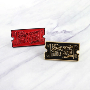 Retro science fiction movie ticket enamel pins in red and black with metallic finish