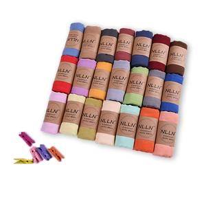 Variety pack of 21 solid color cotton linen kids scarves in a neat rectangular grid layout
