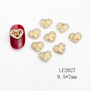 Hollow heart nail art charms with 520 text and inlaid rhinestones on golden alloy base