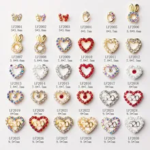 Size chart showing various dimensions for heart and butterfly nail art charms and gems