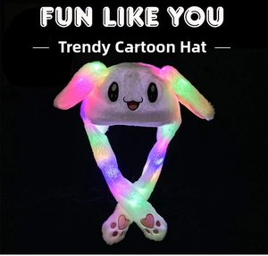 Detail of plush bunny hat with glowing colorful LED lights and pink paw paws