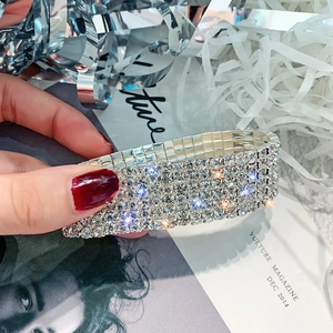 Luxurious wide multi-layer silver bracelet with five rows of sparkling white rhinestones